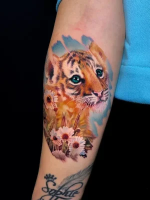 color-little-lion-realism-tattoo-Quang Pham-Qneedle