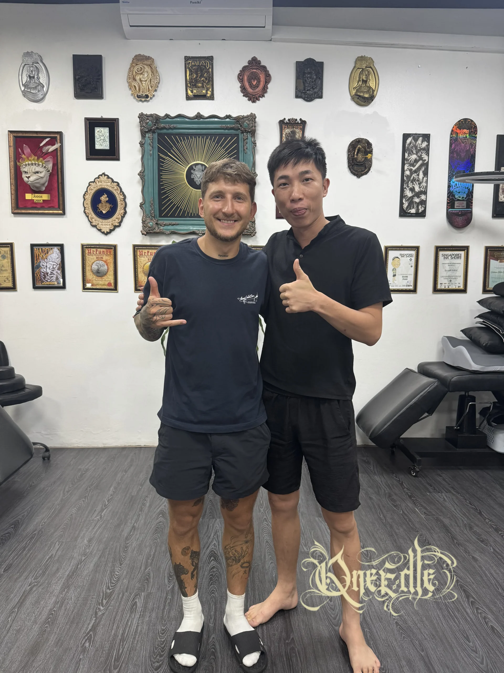 artist Tuan with our clients- Qneedle Studio
