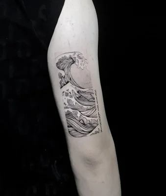 Black and white Japanese-style ocean wave tattoo- Qneedle Studio