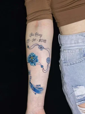Colorful lucky blue poeny charm tattoo-Qneedle-Studio