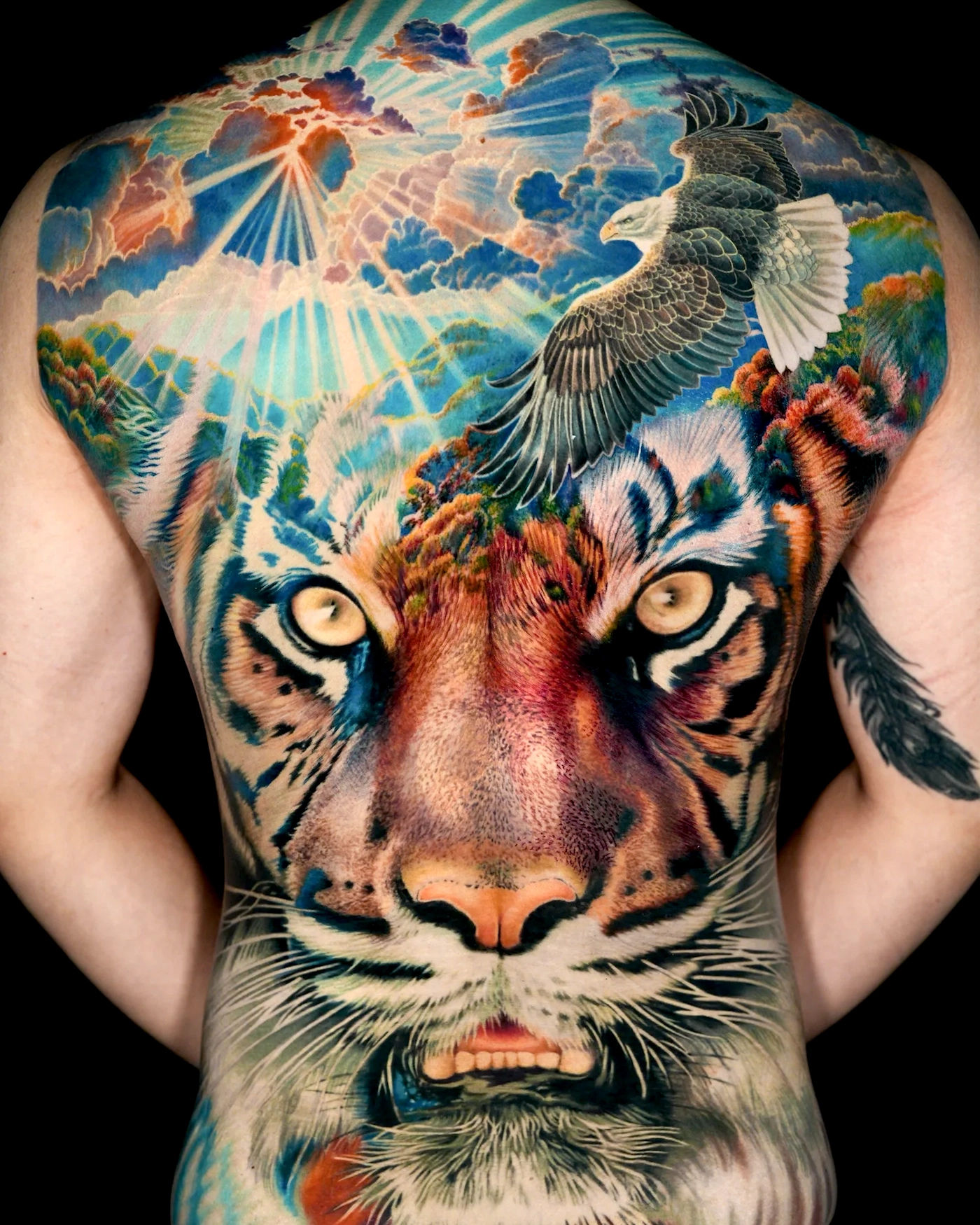 Full back color realism tiger and eagle tattoo by Quang Pham